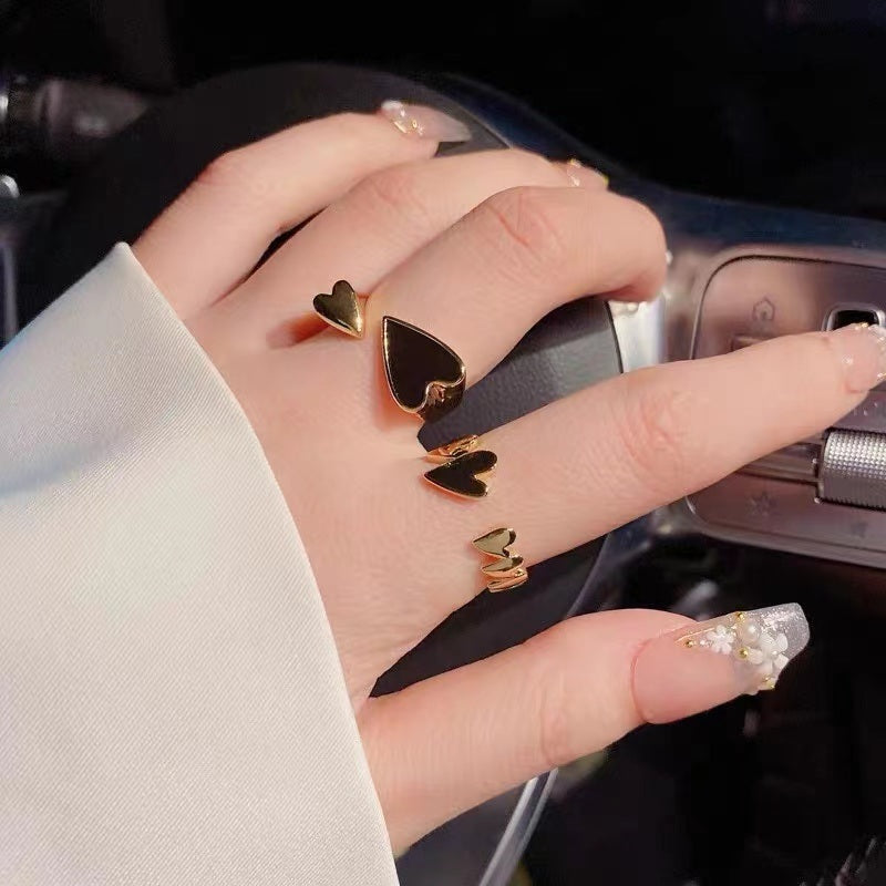 2022 New Creative Metal Black Enamel Peach Heart Stitched Gold Color Rings Accessories For Women at Korean Fashion Jewelry Party